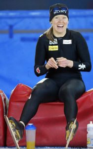 Cindy Klassen with Canadian flag